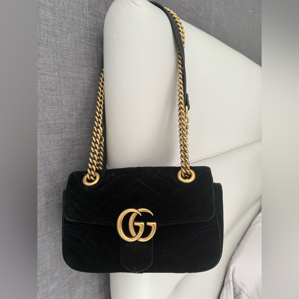 Gucci Black and Gold Shoulder Bag with Iconic GG Logo